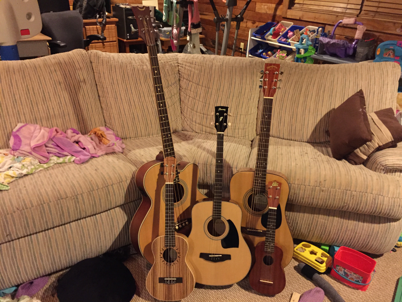 Seen here with a tenor ukulele and a soprano/regular ukulele as well.